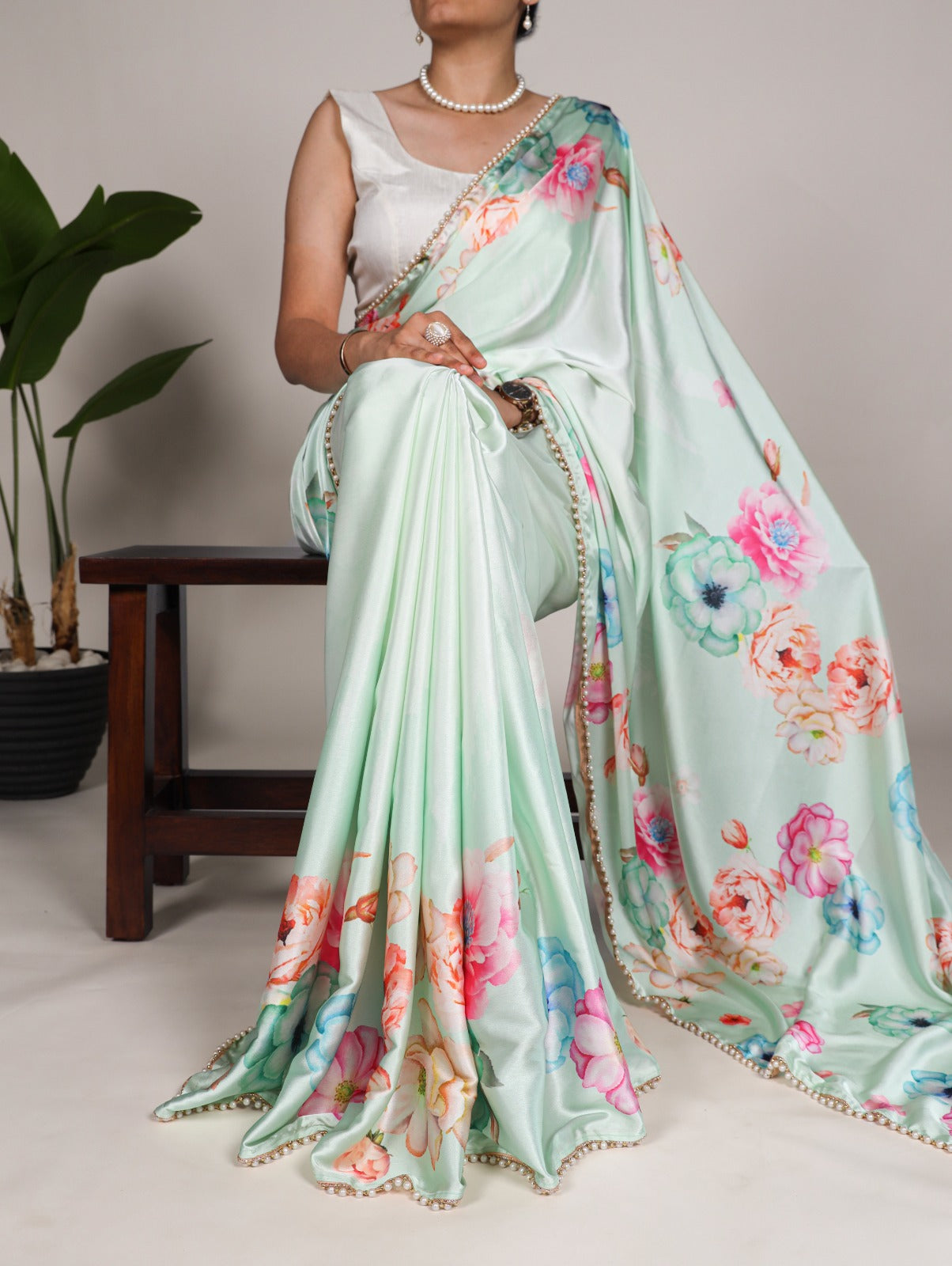 Mesmerizing Pista Green Satin Silk Floral Printed Pearl Lace Border Saree - INDIAN ELEGANCE