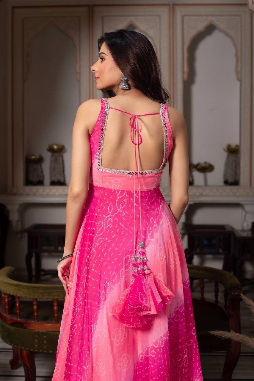 Festive Rani Pink Anarkali with mirror work & fancy lace dupatta.
