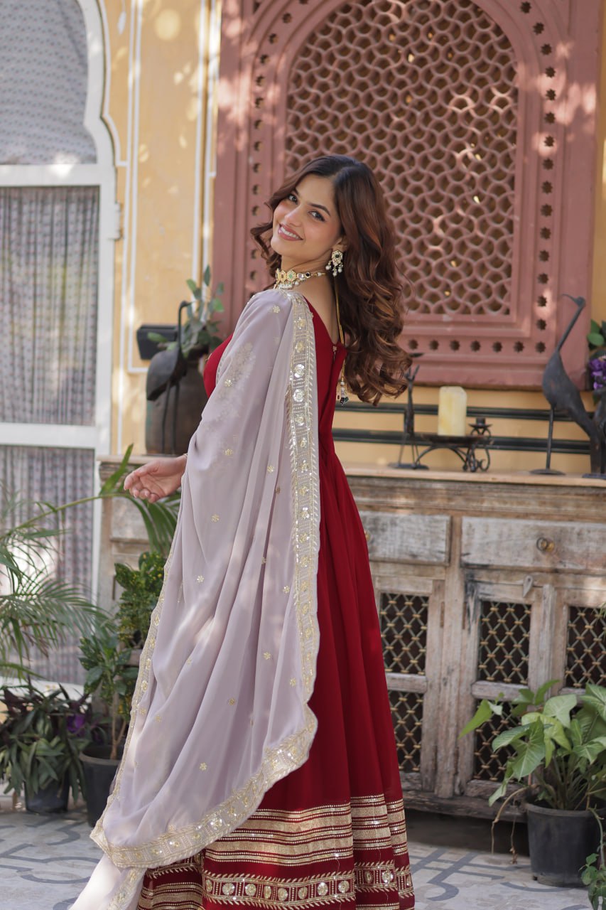 Spellbinding Maroon Faux Georgettte Embroidered Sequins Worked Gown - INDIAN ELEGANCE