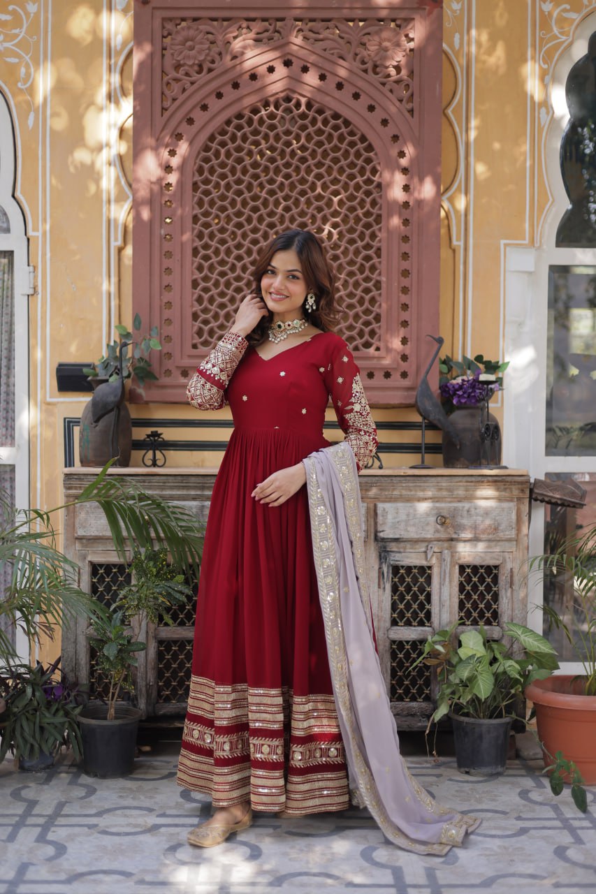 Spellbinding Maroon Faux Georgettte Embroidered Sequins Worked Gown - INDIAN ELEGANCE