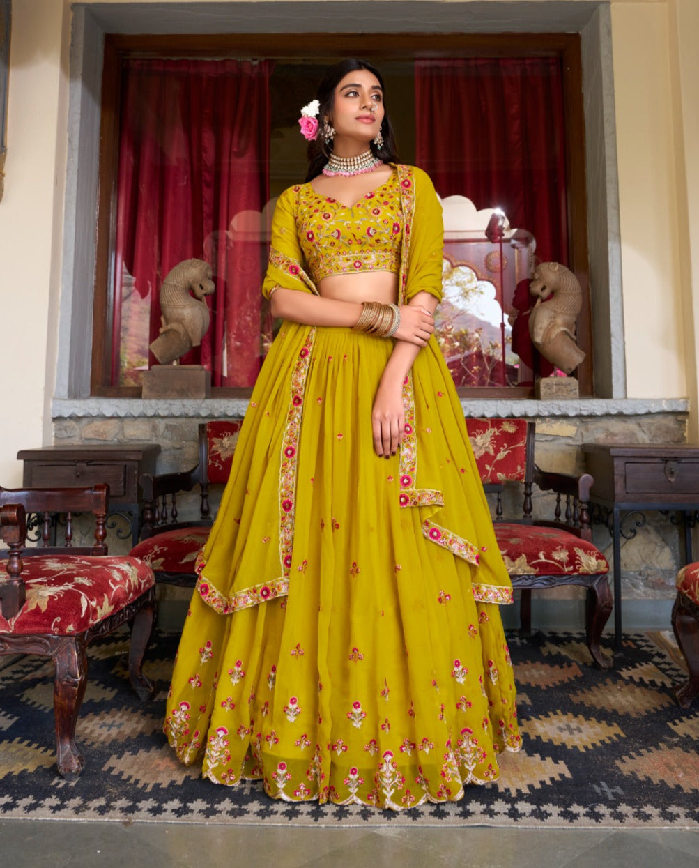 Graceful Yellow Georgette Sequins Thread Worked Lehenga Choli