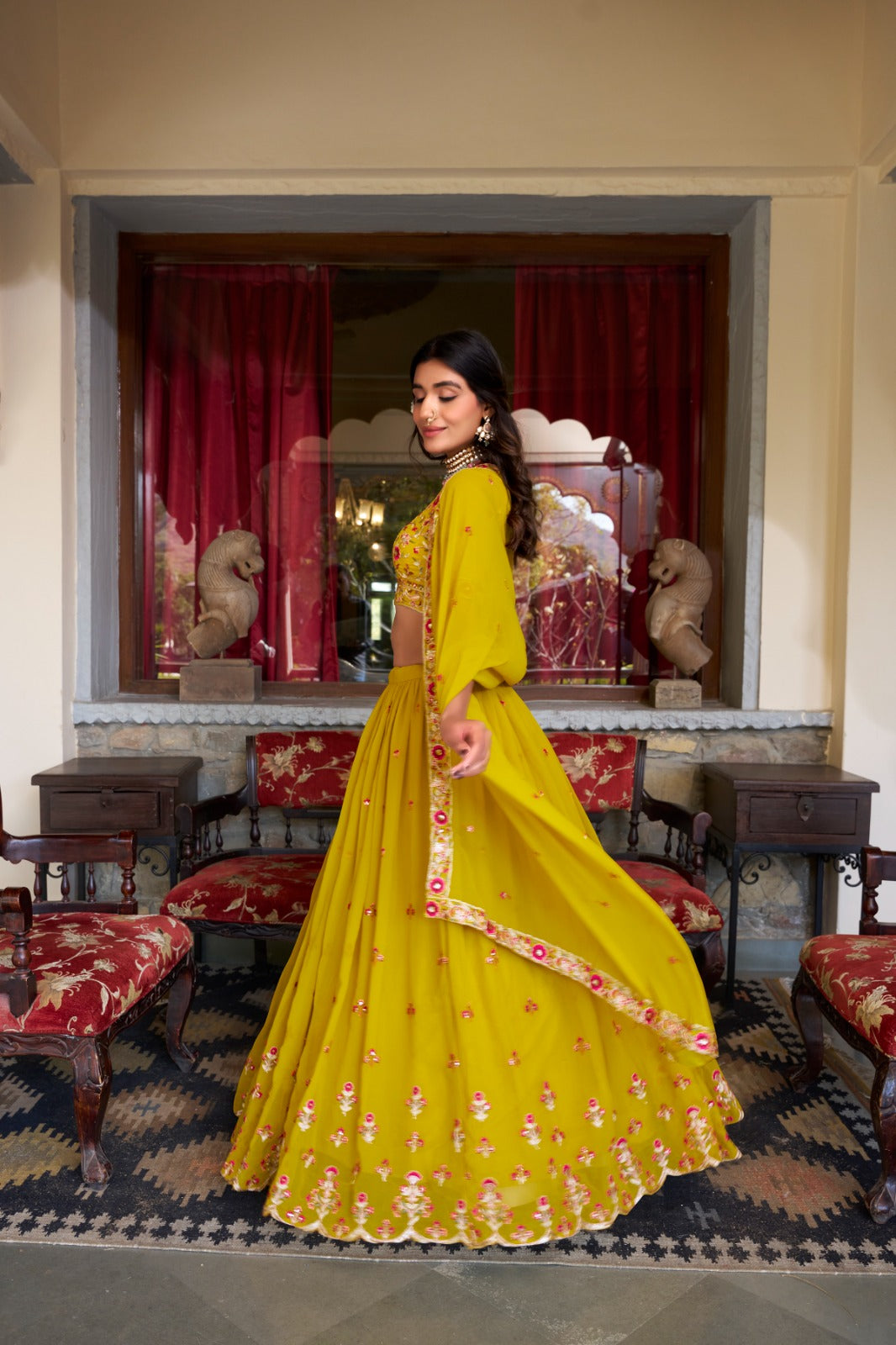 Graceful Yellow Georgette Sequins Thread Worked Lehenga Choli