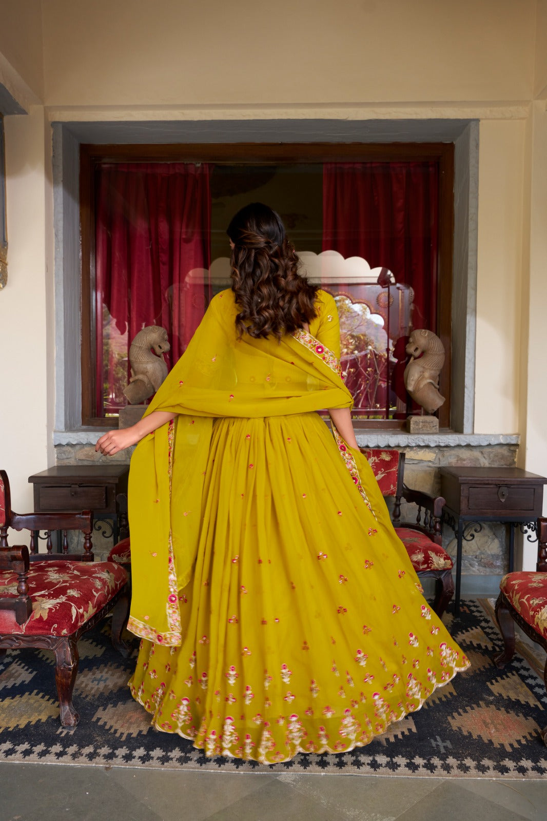 Graceful Yellow Georgette Sequins Thread Worked Lehenga Choli