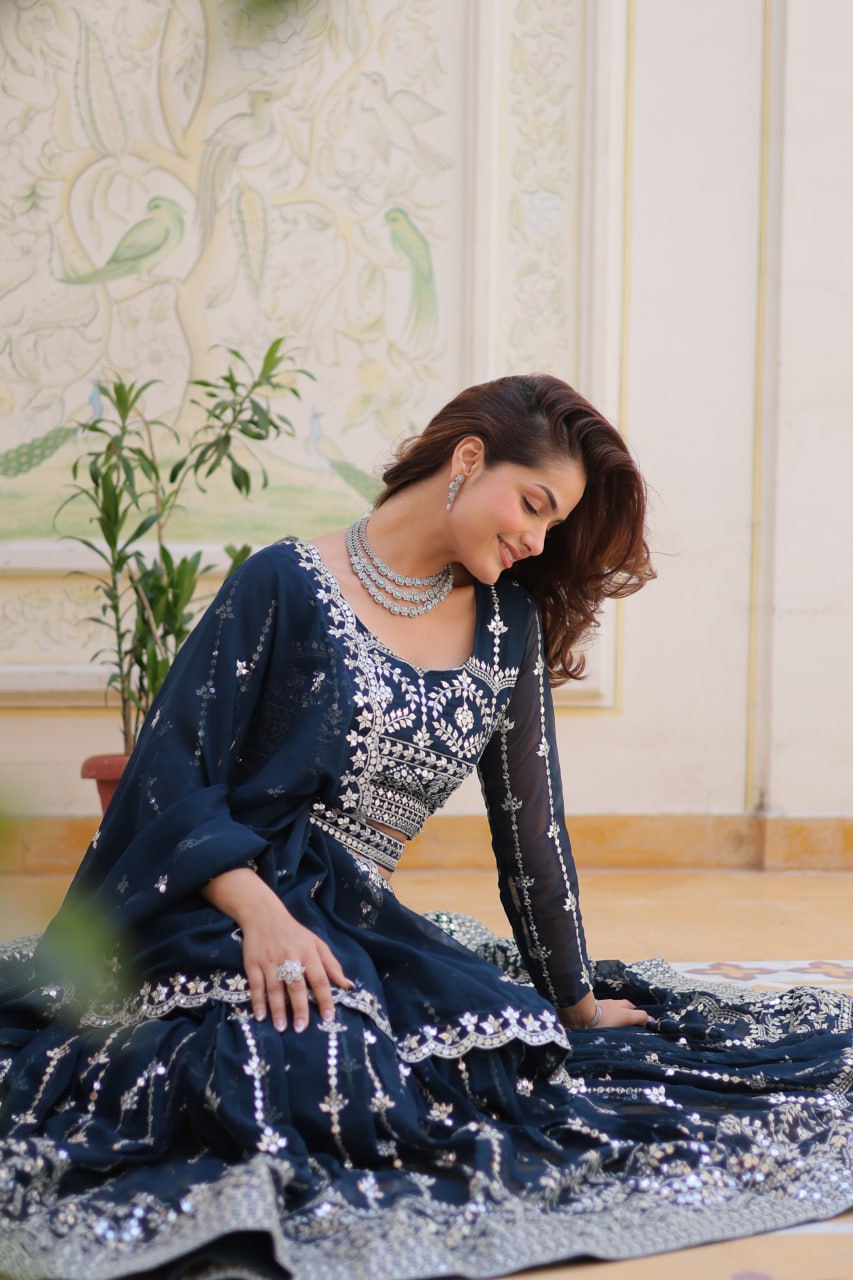 Graceful Faux Georgette Heavy Sequins Embroidered Lehenga Choli