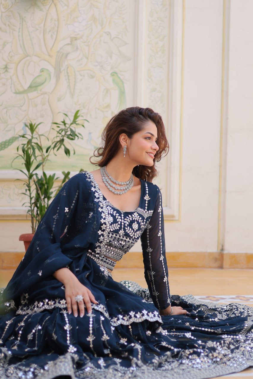 Graceful Faux Georgette Heavy Sequins Embroidered Lehenga Choli