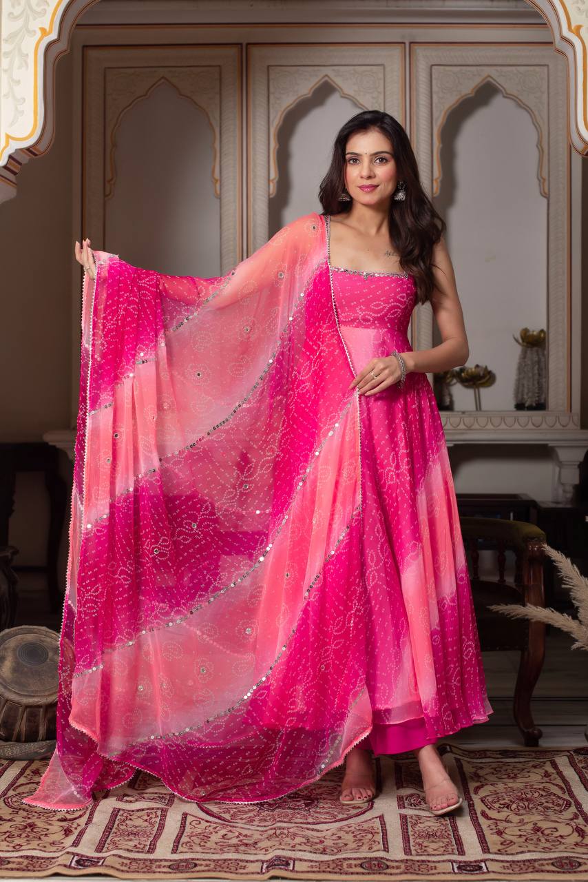 Festive Rani Pink Anarkali with mirror work & fancy lace dupatta.