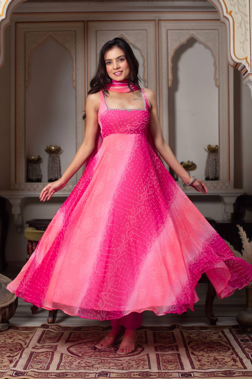 Festive Rani Pink Anarkali with mirror work & fancy lace dupatta.